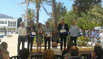 El alcalde y el concejal de Playas recogen las Banderas Azules de las playas de Puerto de Sagunto, Almardà y Corinto